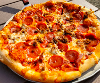 The Mitten Brewing Company signature dishes Curse of the Goat Pizza
Cheesy Breadsticks
Hog Heaven Pizza